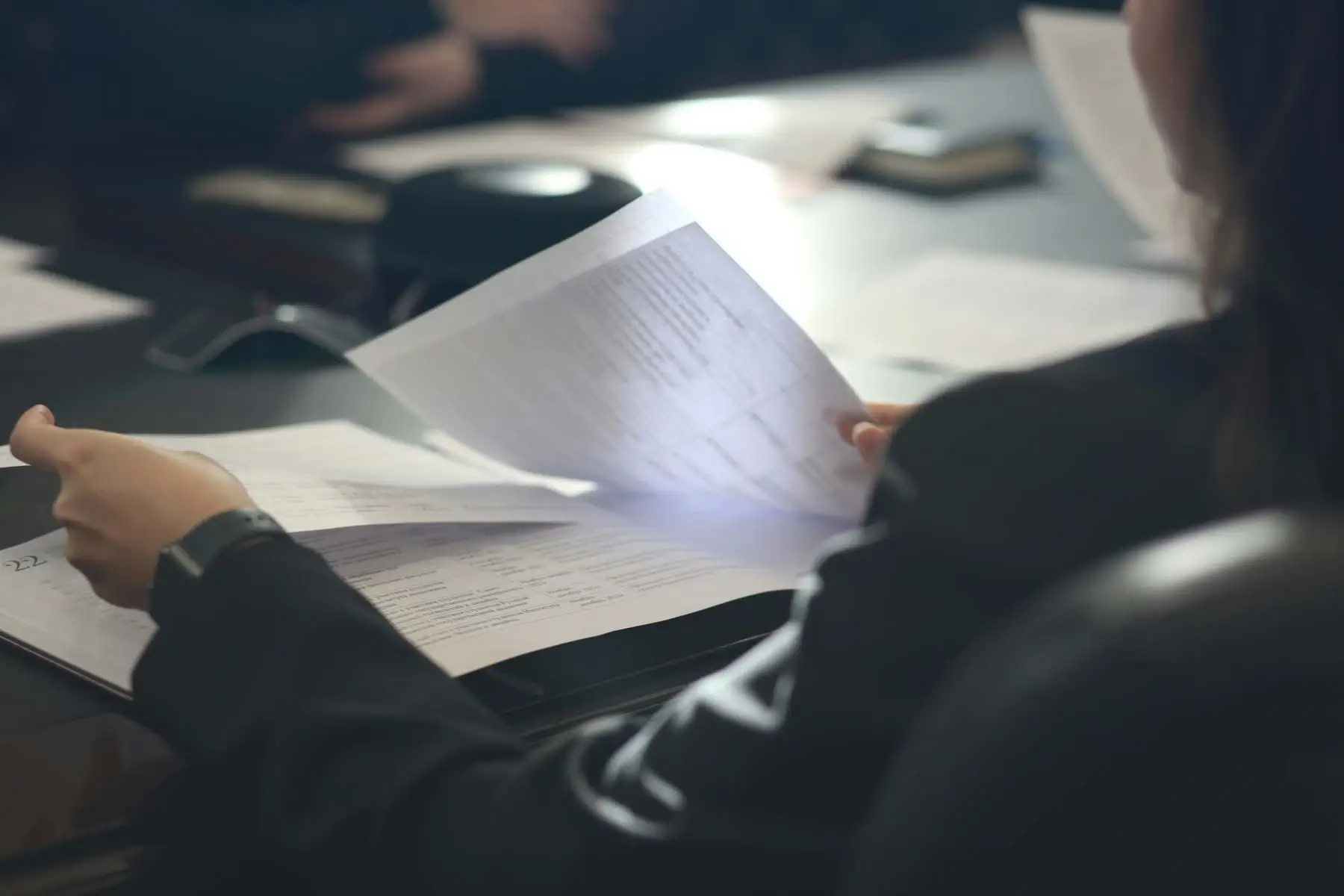 A person reading a document