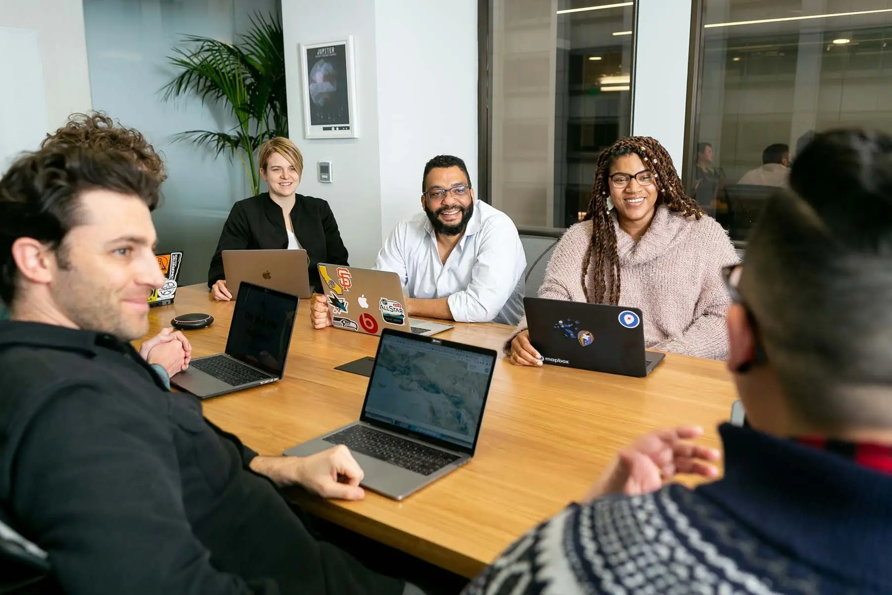 A group of employees around a table