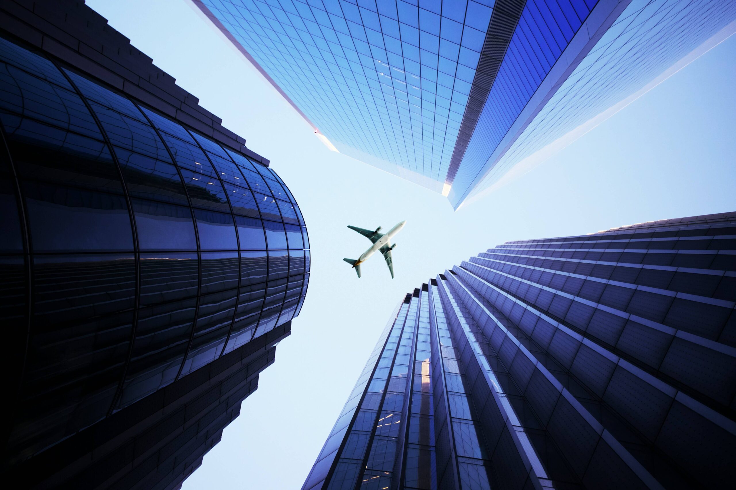 A plane flying over a city