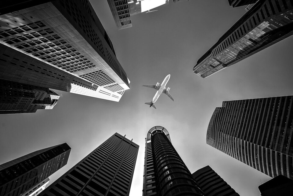 A plane flying over a city