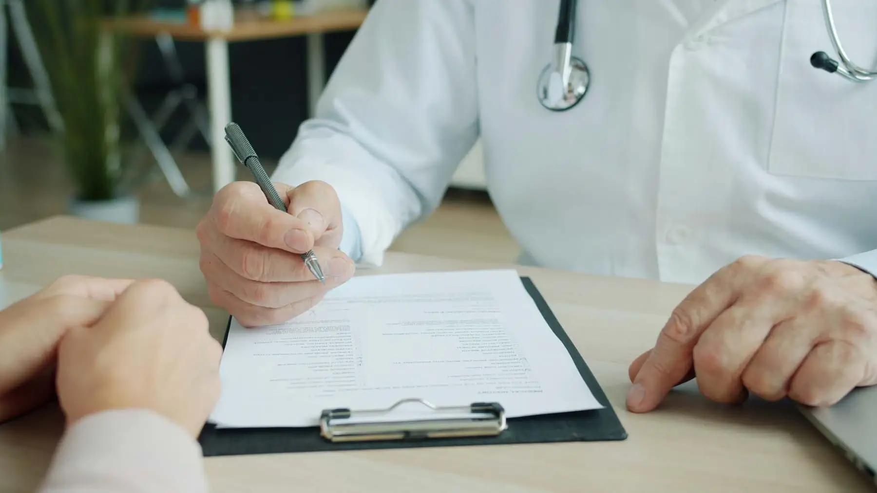 A doctor with a document